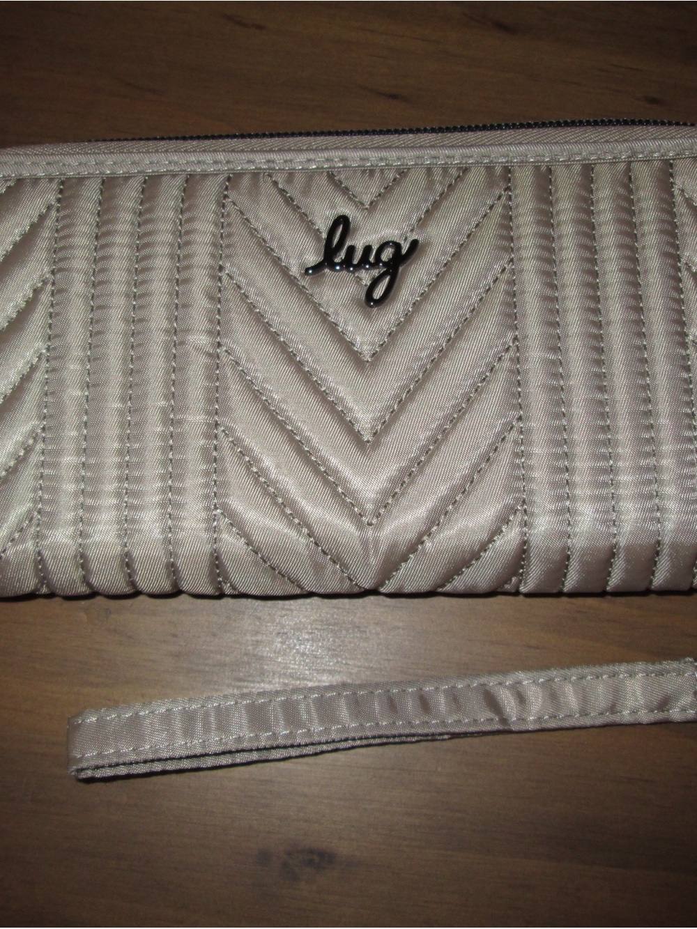 lug Quilted Cream Wristlet Clutch with Chevron Stitching
